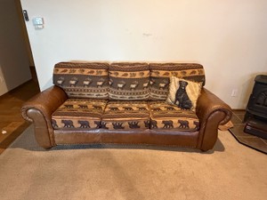 Leather Couch with Bear, Moose and Canos