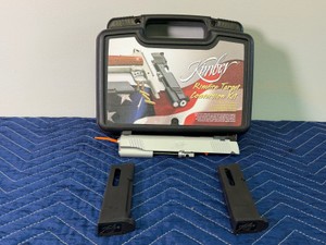 Kimber Rimfire Target Conversion Kit in silver, designed to allow standard .45 ACP 1911 pistols to shoot .22 LR ammunition.