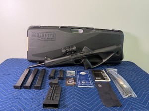Beretta Cx4 Storm semi-automatic carbine rifle chambered in 9mm with Leapers UTG red dot sight, manual, case, cleaning kit, 5 magazines, speed loader and More - Permit and Background Check Required - See description for more info