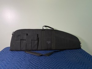 Cabelas Tactical Rifle Case with Miltiple Pouches to Hold Accessories and Magazines