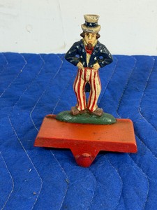 vintage Uncle Sam cast iron Christmas stocking hanger