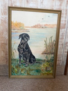 Framed black Labrador retriever painting, consistent with vintage sporting art styles