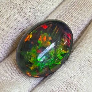23.90 Carats Natural Welo Opal (Oval Cabochon) Retail $3,585