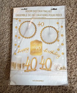 Cheers to 40 room decorating kit  great for 40th birthday party or 40th anniversary  7 feet of gold and white string decorations  two table centerpieces  two paper fan decorations  four paper cut outs.