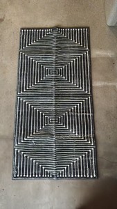 Black and white geometric runner with pad it back  2 x 4  washable material