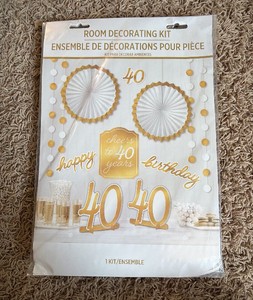 Cheers to 40 room decorating kit  great for 40th birthday party or 40th anniversary  7 feet of gold and white string decorations  two table centerpieces  two paper fan decorations  four paper cut outs.