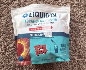 Liquid IV Hydration Mutiplier Mix, Ring Pop Flavor, Package Says 30 Packets, but there are 21 Packets Included, Open Main Container But Raining Packets are Unopened and Product Doesnt Expire until 2028