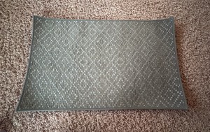 Green Indoor Rug With Black Rubber Bottom, 27 x 17
