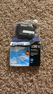 Epson 220 XL High Capacity Ink Cartridge Cyan Color. Open Packaging