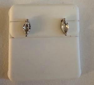 925 Silver Marquise-cut solitaire stud earrings featuring elongated, boat-shaped clear stones set in prongs of 925 silver.