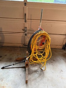 Extension Cord Storage Stand With Multiple Cords
