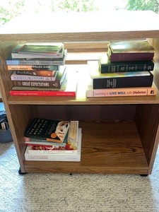 Rolling Oak Cabinet w Books