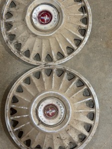 Two Mustang Hubcaps