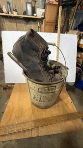 Bucket of old ice skates