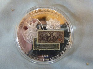 Electricity Presenting Light to the World Five Dollar  Commemorative Coin