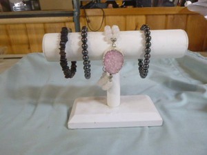 4 Bracelets on Display Stand