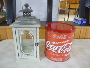 Decorative Lantern and Coca-Cola Tin