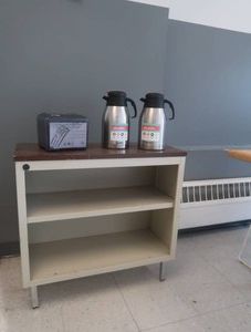 METAL SHELFCABINET AND 2 NEWER STAINLESS COFFEE SERVERS