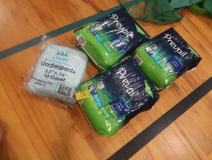 4 PACKAGES OF BED PADS
