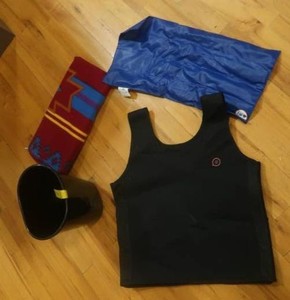MISC LOT - COMNPRESSION VEST, BLANKET, GARBAGE, AND WEIGHTED LAP PAD