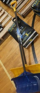2 SNOW SHOVELS AND 2 50LB BAGS OF POWER THAW SALT