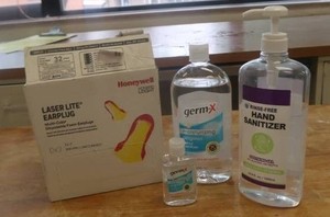 NEW BOX OF LAZERLITE EARPLUGS AND HAND SANITIZERS