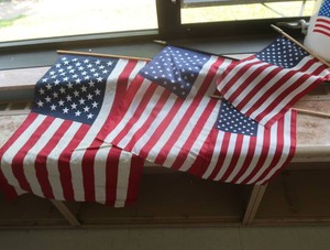 BUCKET AND AMERICAN FLAGS