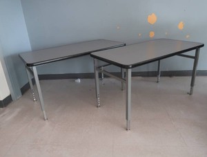 2 NICE HEIGHT ADJUSTABLE TABLES