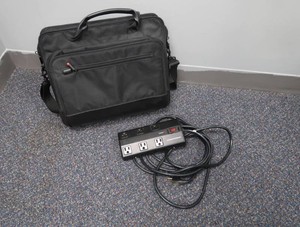 COMPUTER BAG AND SURGE PROTECTOR