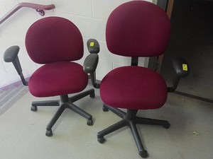 2 BURGUNDY COLORED OFFICE CHAIRS