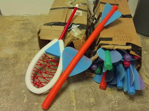 12 FOAM LACROSSE PADDLES AND FOAM SPACE SHUTTLES