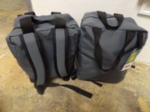 2 NEW BACKPACKS FILLED WITH NEW MISC ITEMS