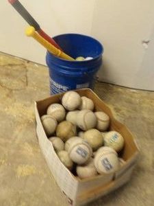 KIDS PLAY BATS AND BALLS