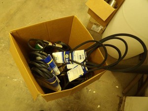 BOX FULL OF INDUSTRIAL BELT HOSES