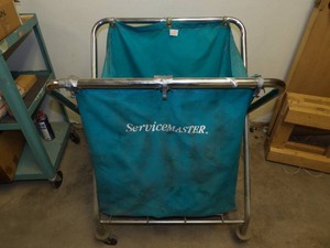 SERICEMASTER LAUNDRY BAG ON METAL ROLLING CART