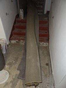HUGE ROLL OF RUG