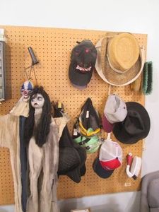 Collection of baseball hats and oth...