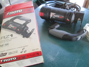 RotoZip Rz1 with original box and a...