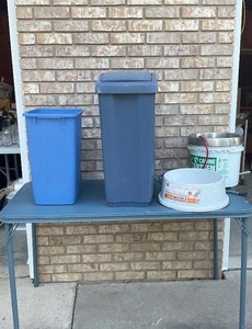 Lot of trash cans and heated pet bowls
