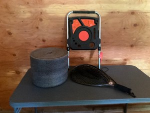 Roll of foam, landing net and Air deck paint tray