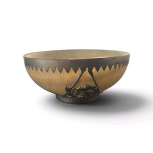 Vintage Chinese stone bowl decorated with silver-tone metal dragon motifs.