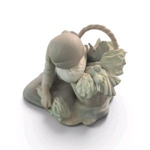 Lladr porcelain figurine, likely the Green Grocer (model #1087) with a matte finish.