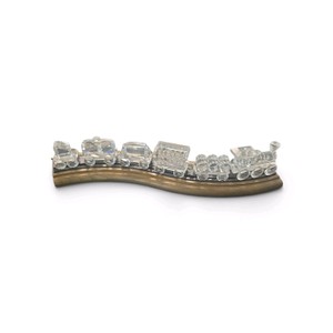 Swarovski Crystal train set featuring clear crystal figurines arranged on a custom track.