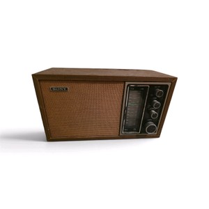 Vintage 1970s Sony TFM-9440W AMFM solid-state transistor radio.
