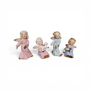 4 Vintage Lefton porcelain angel figurines Valued at $100