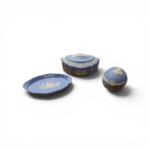 vintage Wedgwood blue Jasperware pieces, specifically a trinket dish, a lidded trinket box, and a small decorative egg.