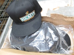 12 Mickeys malt liquor caps...