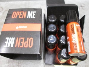 12 Pack of String sexy hair spray 1...
