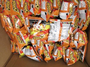 Box of Cheetos flamin hot 1 oz bags...