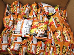 Box of Cheetos flamin hot 1 oz bags...